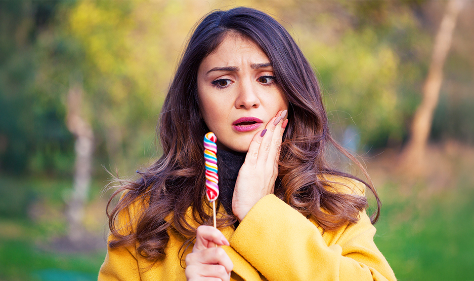 woman suffering from dental pain