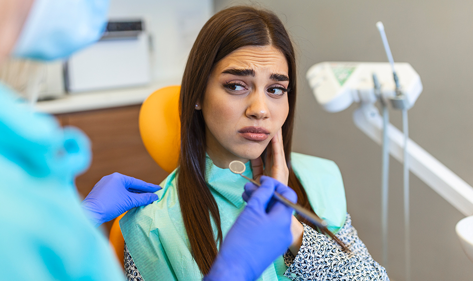 young woman with jaw pain