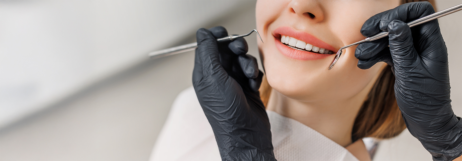 woman smiling at dentist